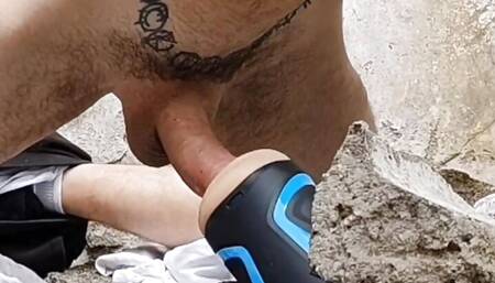 Outdoor fucking fleshlight on rocks