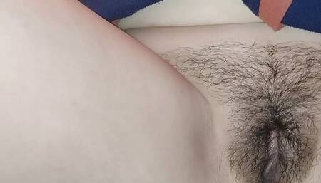 single beautiful girl fucks her homemade hairy pussy with a sex toy