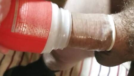Fucking a Tenga cup with a condom, then filling the condom with my piss!