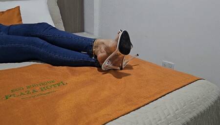 Milah Arches the Queen of the highly arched feet on the bed