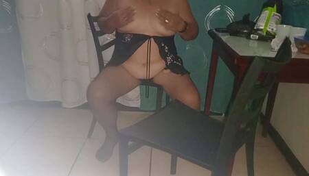 Grandma in lingerie squirts On the chair she caresses her pussy and models her delicious ass