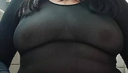 mature milf shows tits in black transparency below the hairy black