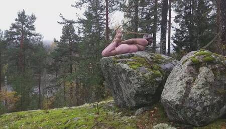 Naked outdoor hogtie