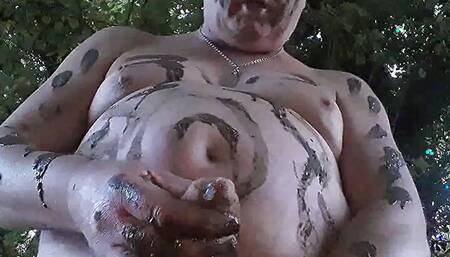 Exotic chubby guy with mud in his fat body !
