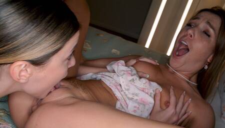 Lesbian Alexis Crystal and Angelique Lapiedra sharing a sex toy