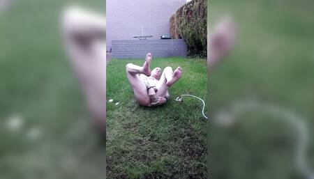 Caged And Soaping Myself In Garden
