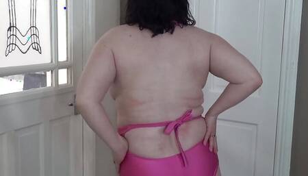 Hot Fat BBW wife stripping teasing with big breasts in pink swimsuit