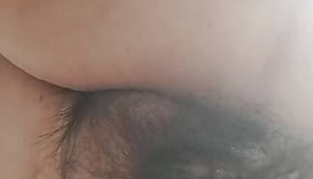 Mature MILF washes bent over showing her hairy and fat pussy