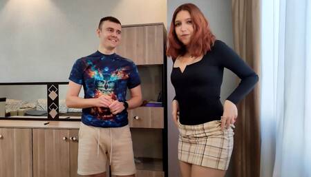 Redhead is sucking his hard cock after losing a game of strip darts