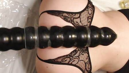 Tiny sissy with huge anal toy