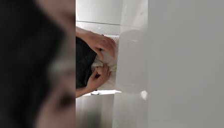 Pissing and Stroking at a Urinal