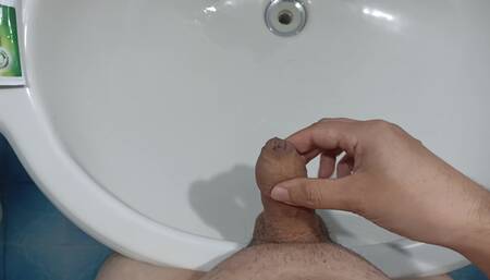 Handjob in the home bathroom sink