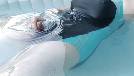 Shemale in sexy one piece swimsuit jerking in jaccuzzi
