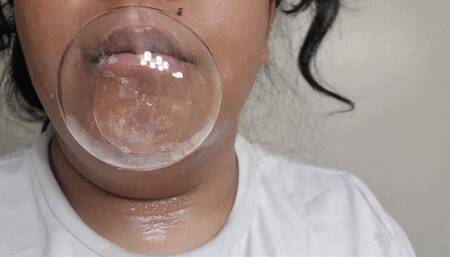 BLOWING SOAPY MOUTH BUBBLES