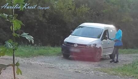 Outdoor car windows cleaning by the road