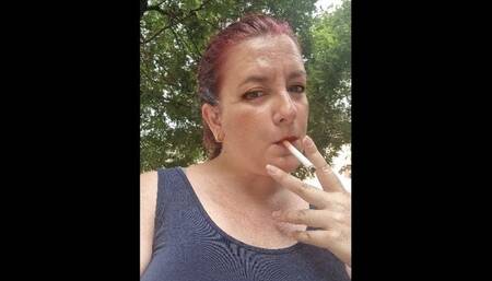 Smoking a Marlboro in a public park 1080HD