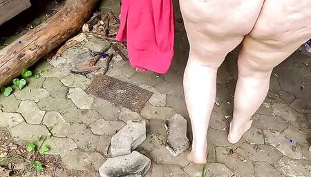 Walking with clamps on pussy through the woods