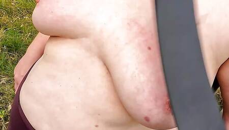 Getting her naked ass and tits spanked with paddle in public