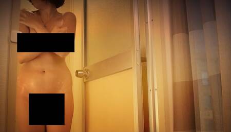 Cute hotwife pleasures herself in the shower\n