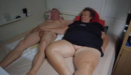 John Is Peeing on the Bed While Jen Plays with Cock