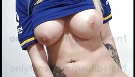 Very hot blonde strips naked while playing with her tits.