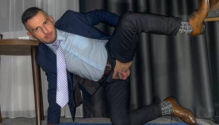 Suited men with open crotch is pissing like a dog and rides the dildo and cums handsfree