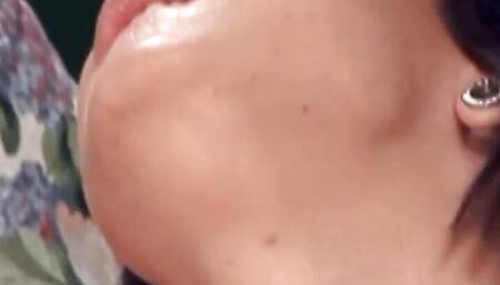 A sexy dark haired babe pleasing a loaded cock with her moves