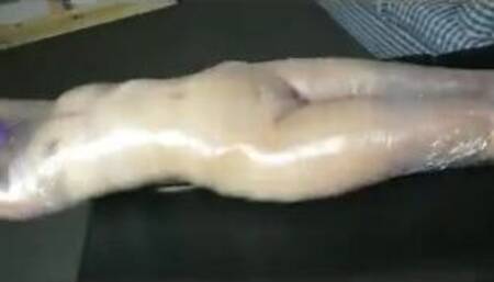 Naked girl plastic wrap bondage
