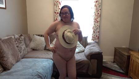 Wife dressed for summer dancing naked in just a straw hat