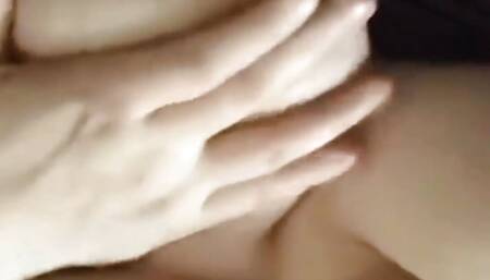 Squeezing my boobs sucking my nipples stimulating my clit with wand legs tied up wide open