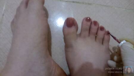 I put light purple nail polish on my shemale feet.