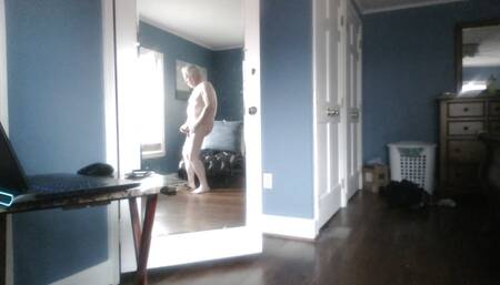 Jerking off by the mirror and window
