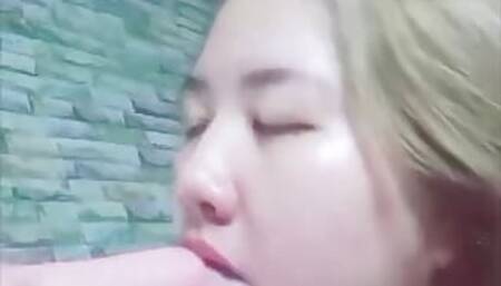 Asian girl horny and wet playing with dildo