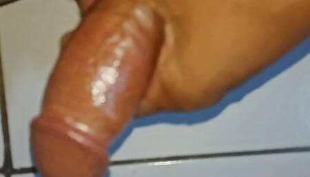 Rubbing your dick with oil