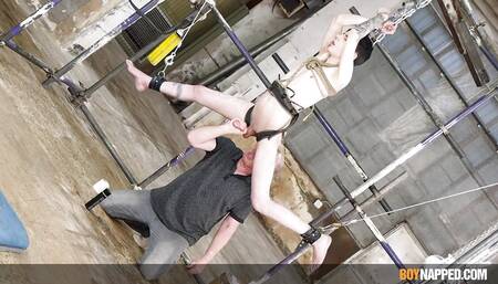 Submissive Jesse Evans endures foot play from Master Xavier