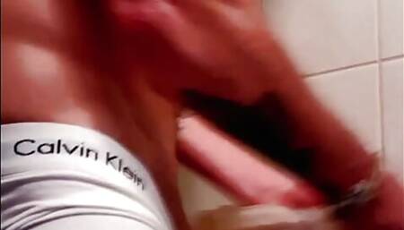 Bearded tattooed man masturbates with fleshly