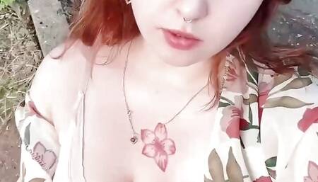 You're on a date with a busty redhead in the woods