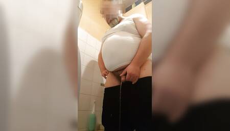 pissing in the toilet