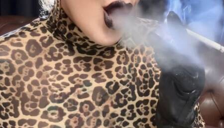 Winston 100s - Black, smoky lips are irresistible, join me - Dangling, Deep Inhales, Multiple pumps, Puffs, Nose exhales, Vinyl pants, Leopard top, Leather gloves, Makeup, Black lipstick