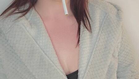 Oiling my tits whilst smoking a cigarette