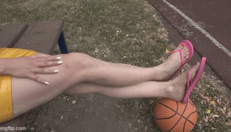 tapping the ball in the slippers on the field I