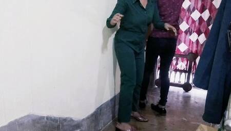 Both staff fiercely under the office ladder