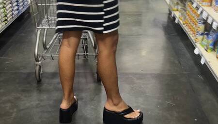 He discovers Dalilah in the supermarket playing with her flip flops