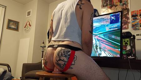 Tattooed Gaymur Opens His Ass While Attempting To Game