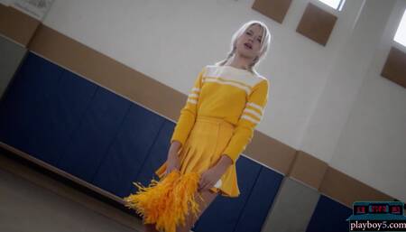 Petite blonde MILF cheerleader stripping
