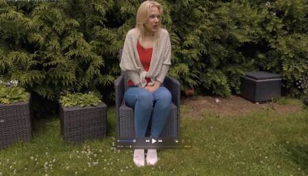 Aston Wilde wets her jeans in the garden