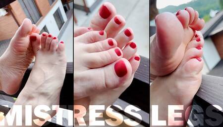 Barefoot with red toenails on the balcony (MP4 4K Portrait Mode)