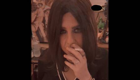 Jizz Taylor enjoys a Marlbro Red before she heads out for a night on the town...