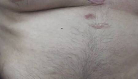 Chubby guy playing with his belly and his cock