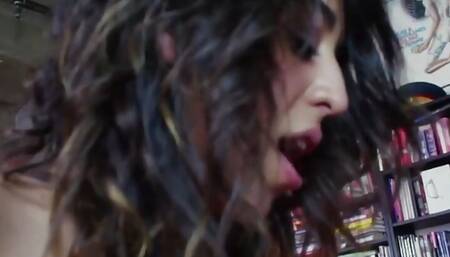 A Group of Three Lesbian Friends Is Having Fun in a Room Full of Books